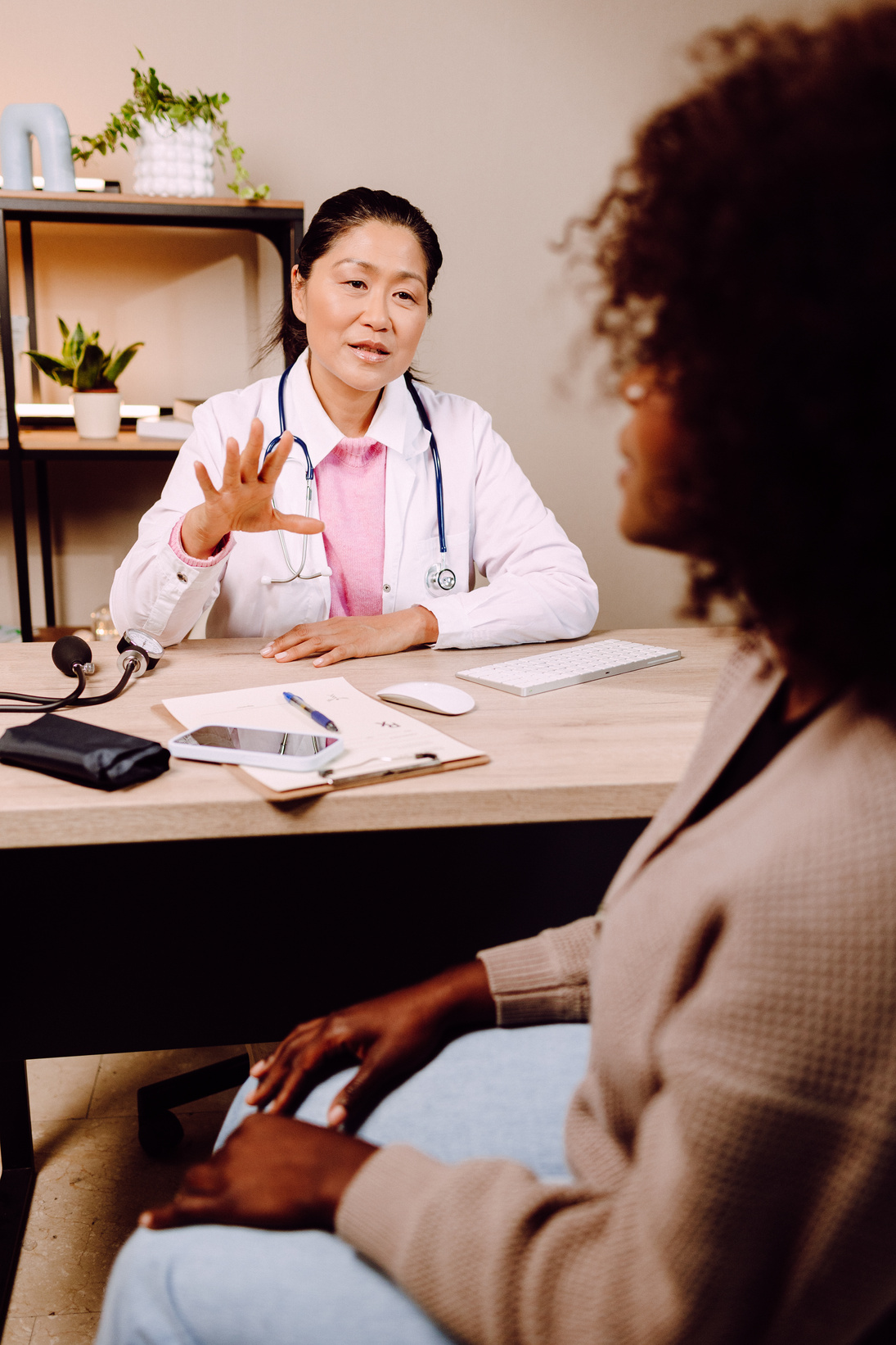 Female Doctor Talking to a Patient