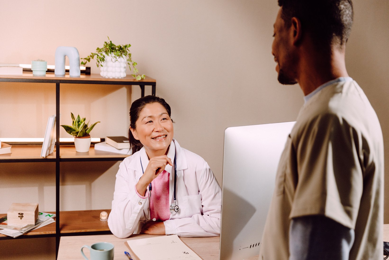 Female Doctor Talking to a Male Nurse